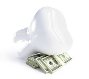 Giant tooth and money