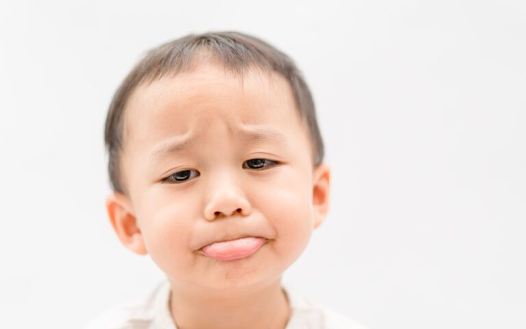 Child with painful tooth